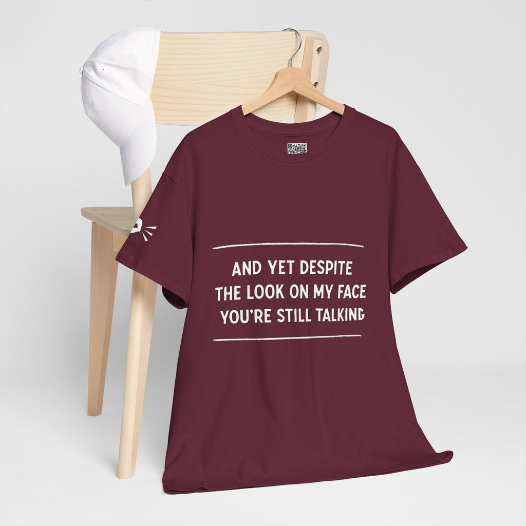 Funny Motivational T-Shirt | “And Yet Despite the Look on My Face You’re Still Talking” Unisex Graphic Tee | Sarcastic Quote Shirt